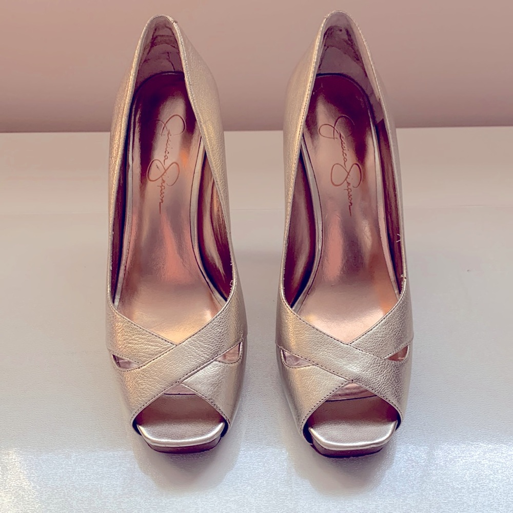 Gold Jessica Simpson gently worn twice. Size 8.5, 3.5 inch heel.